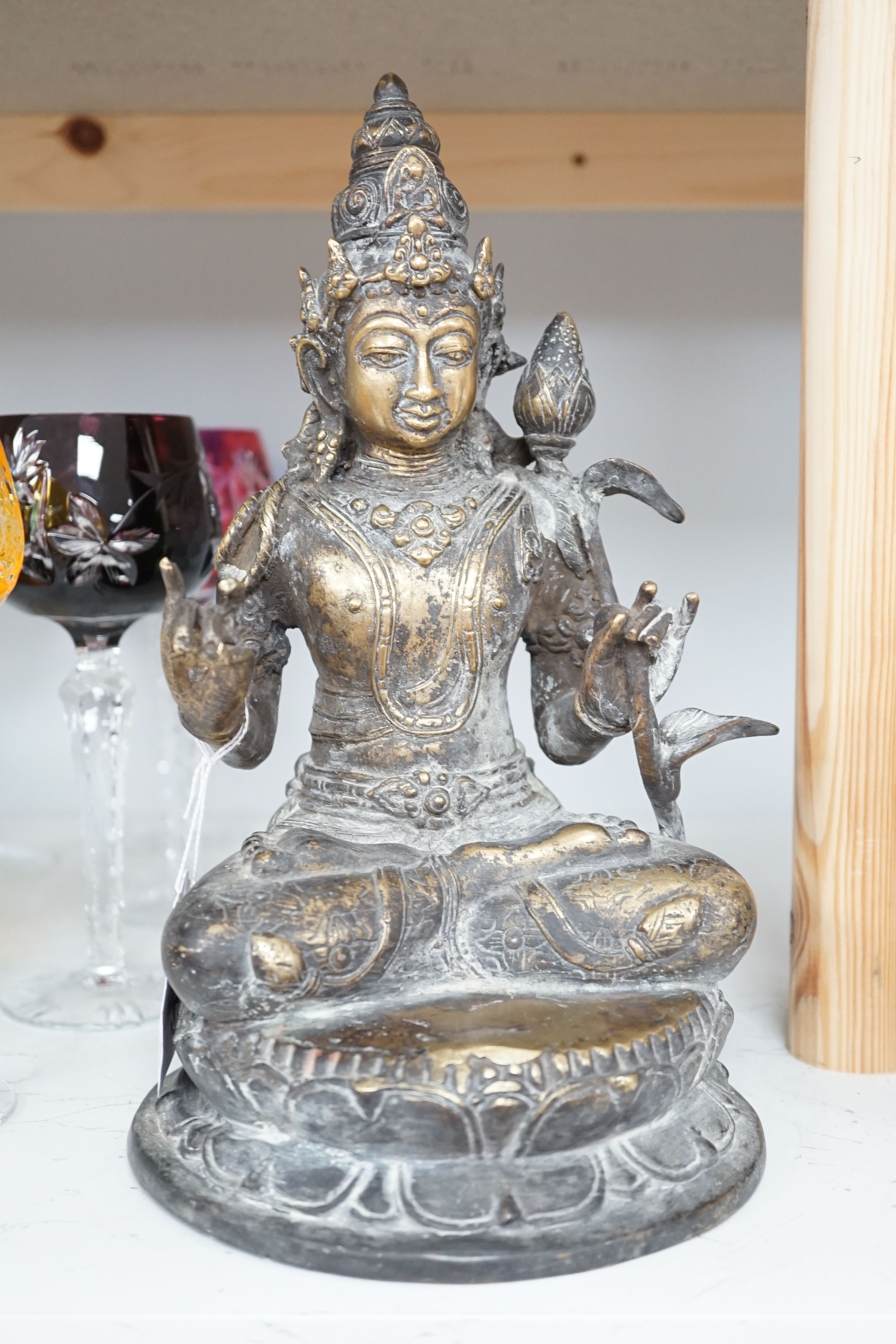 Two Buddhist bronze figures, tallest, 28cm high